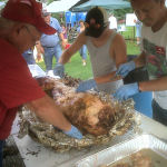 Mr. Hudson and a crew of volunteers finish the feast.
